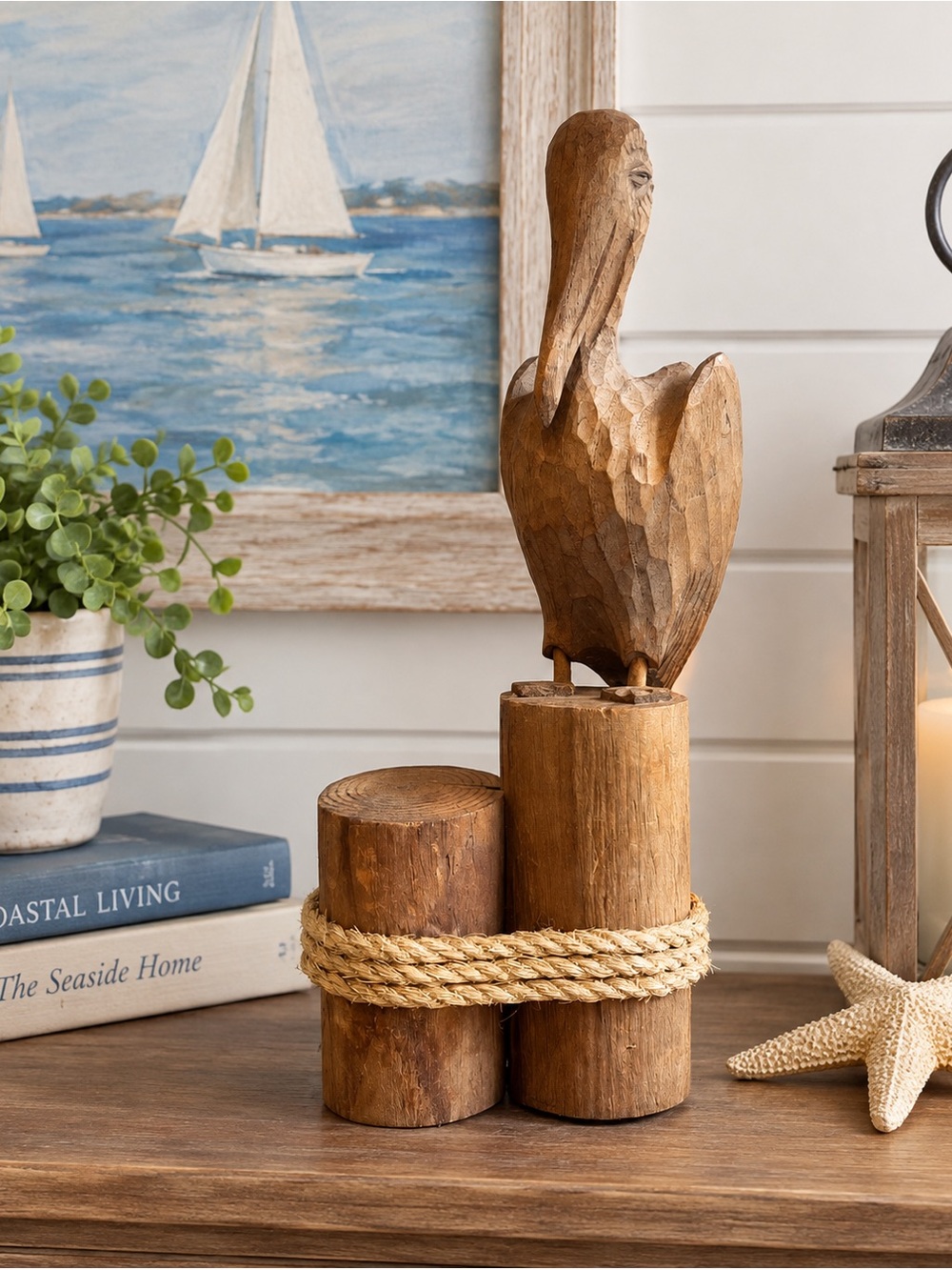 Hand Carved Wooden Pelican Sculpture on logs. Coastal Nautical Rustic Folk Art